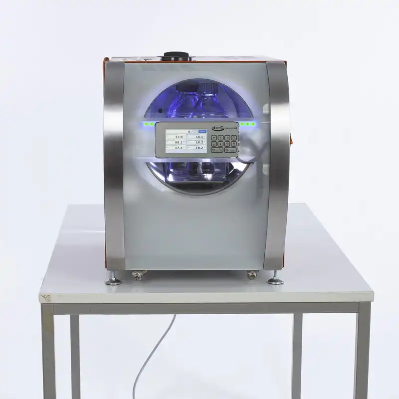 Woman operating steam sterilizer Laboklav 25
